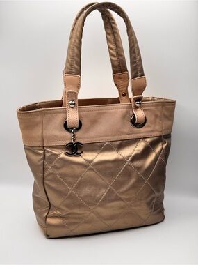 Chanel Paris-Biarritz Tote | Gold Nylon Canvas | CC Charm | Quilted